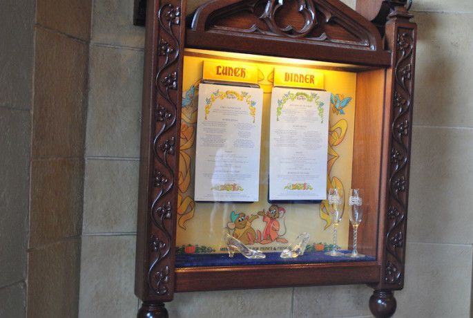Walt Disney World Magic Kingdom dining table service restaurant menu Cinderella Castle