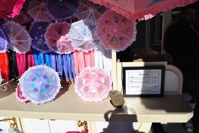 walt disney world magic kingdom shopping personalized merchandise hand drawn umbrellas