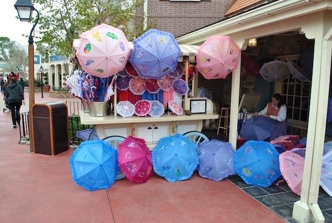 walt disney world magic kingdom shopping personalized merchandise umbrellas